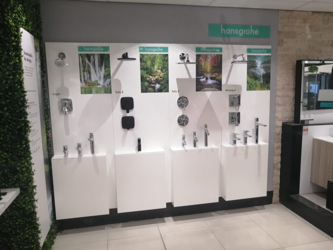 Hansgrohe showroom fit-out with wall-mounted tap and shower displays